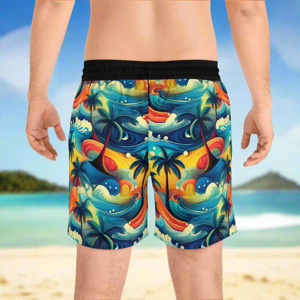 Surfer Standing on the beach looking out over the ocean wearing a pair of Bingo Beachwear Board Shorts.