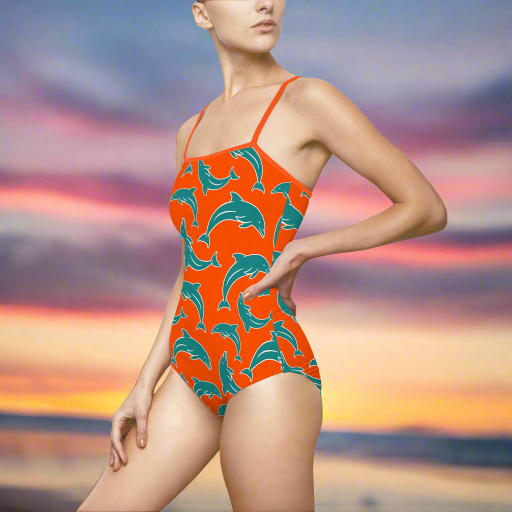 Model in Dolphin 1 Piece Bathing Suite Standing on the beach