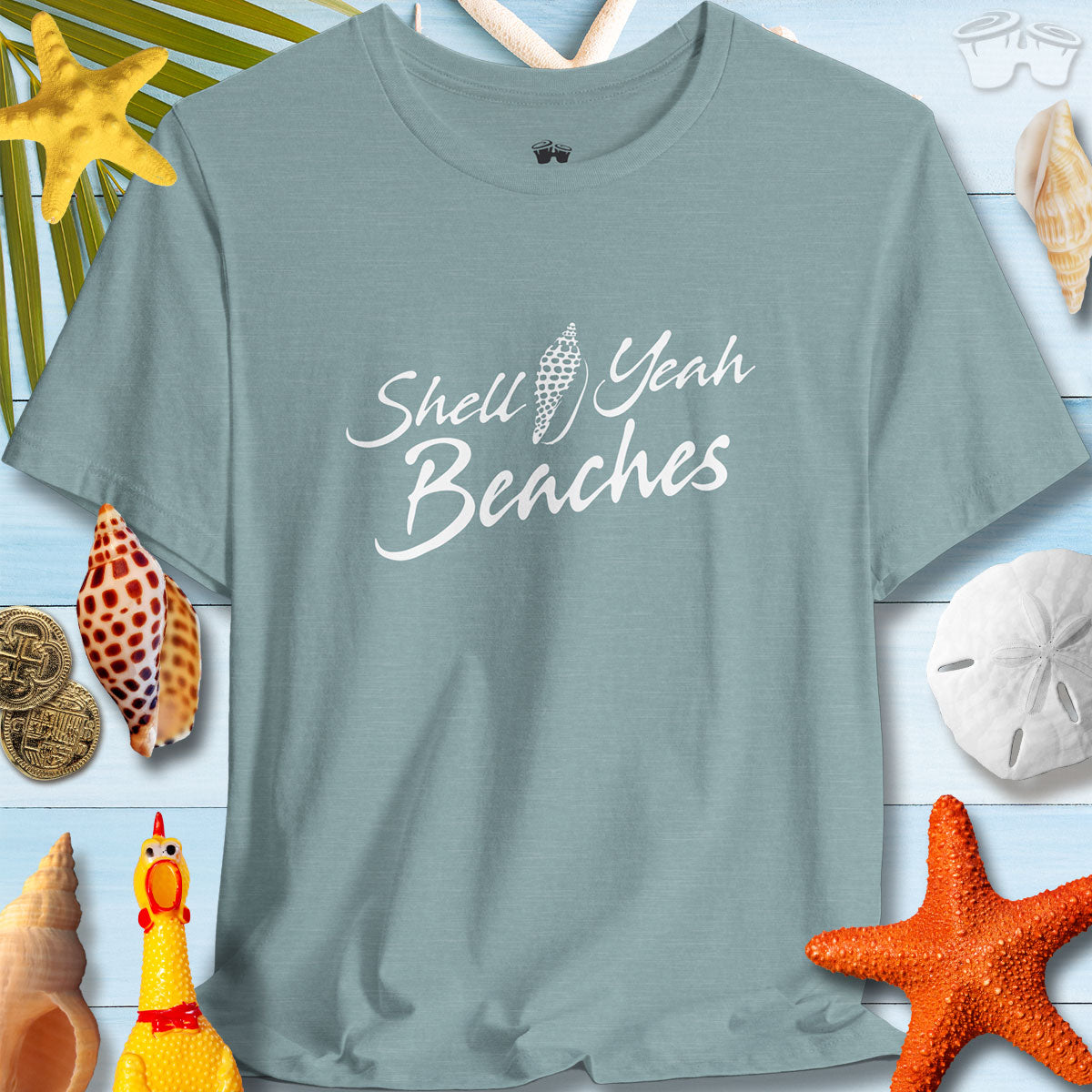 Unisex Shell Yeah Beaches tee with sea shell design, perfect for summer vibes and beach outings.