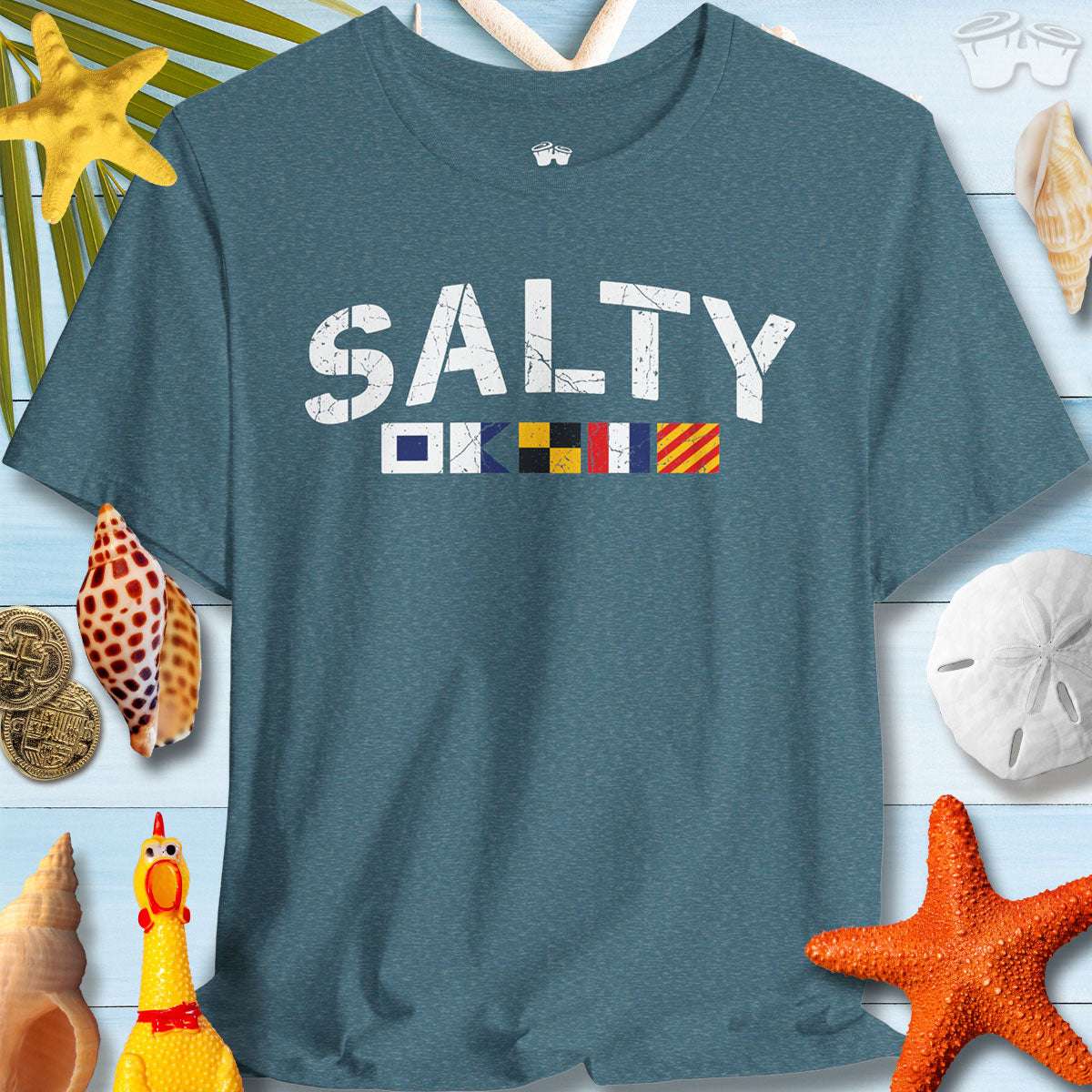 Salty nautical signal flags t-shirt on a beach-inspired background with shells and starfish.
