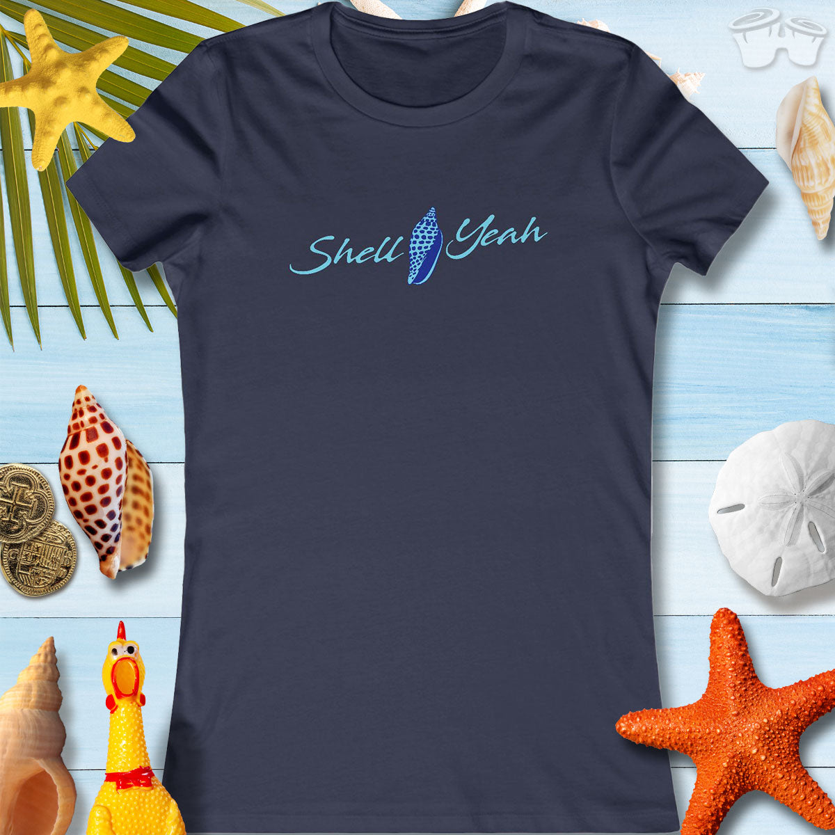 Women's navy tee with 'Shell Yeah' design, perfect for beach lovers and casual summer days.