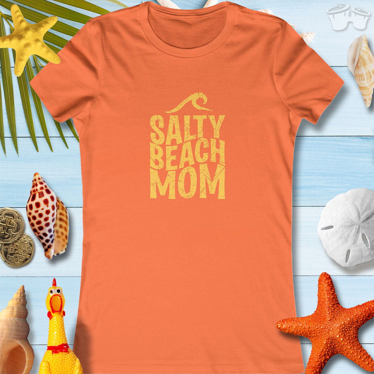 Women's Salty Beach Mom tee in orange, perfect for beach-loving mothers, featuring a stylish and comfortable design.
