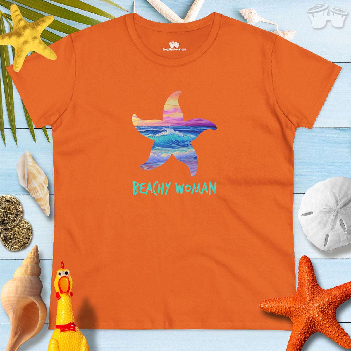 Bright orange t-shirt with starfish design and 'Beachy Woman' text, perfect for summer beach outings.