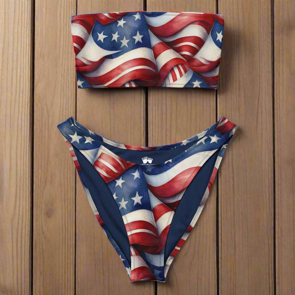 American Flag Bandeau bikini laying on wood boat deck