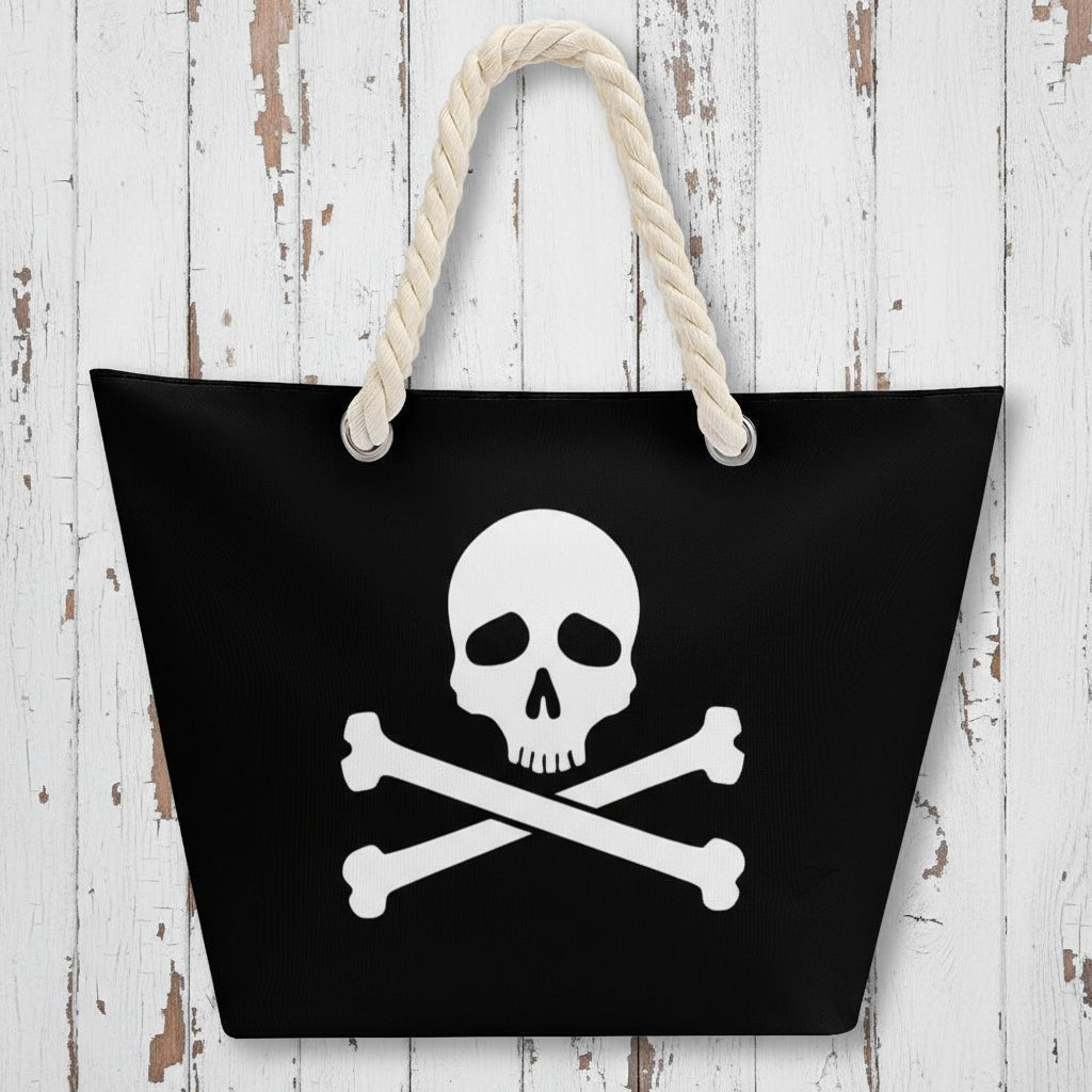 Black bag with a skull and crossbones design and rope handles on a rustic wood background