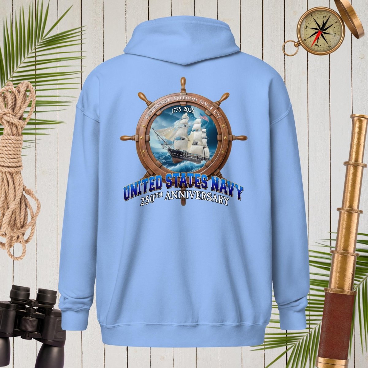 Light blue hoodie with a United States Navy design on the back, surrounded by nautical-themed decor.