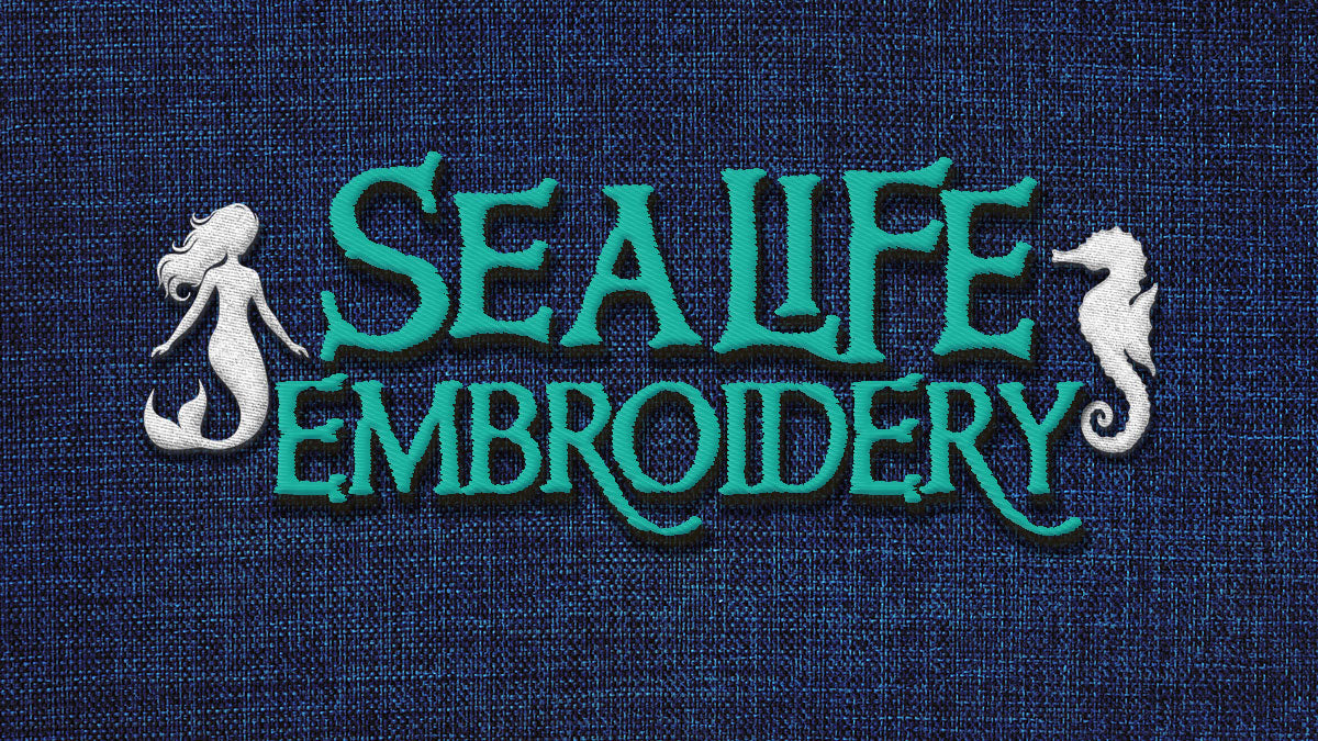 SeaFoam colored SeaHorse Embroidered on a blue denim background