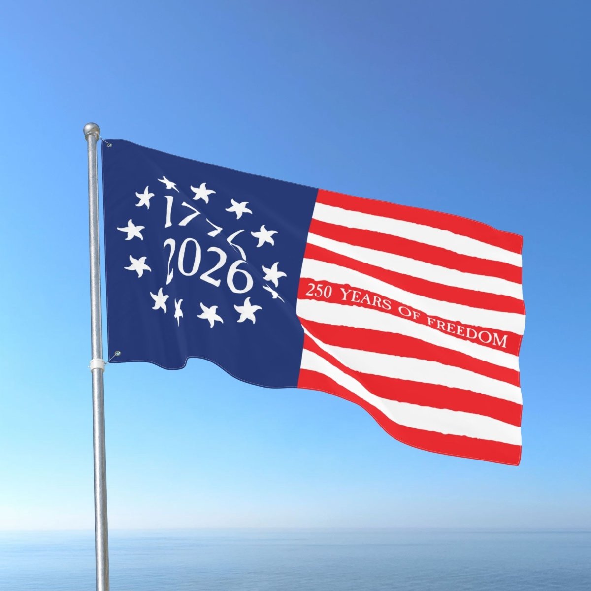 Flag with '1776-2026' and '250 Years of Freedom' text against a blue sky