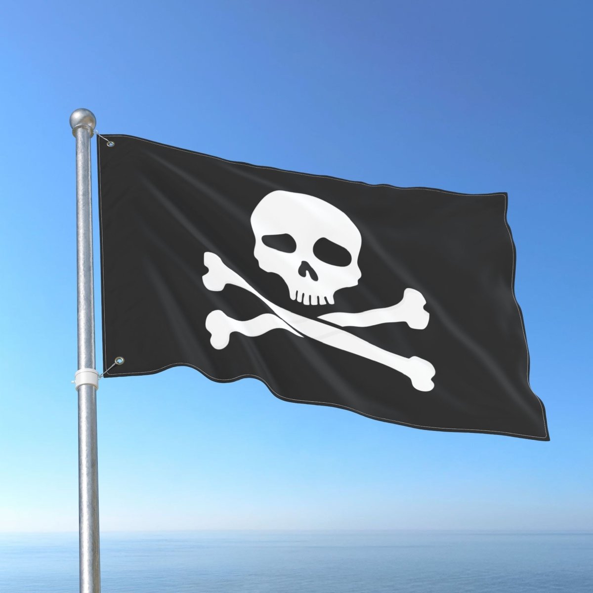 Pirate flag with skull and crossbones on a blue sky background