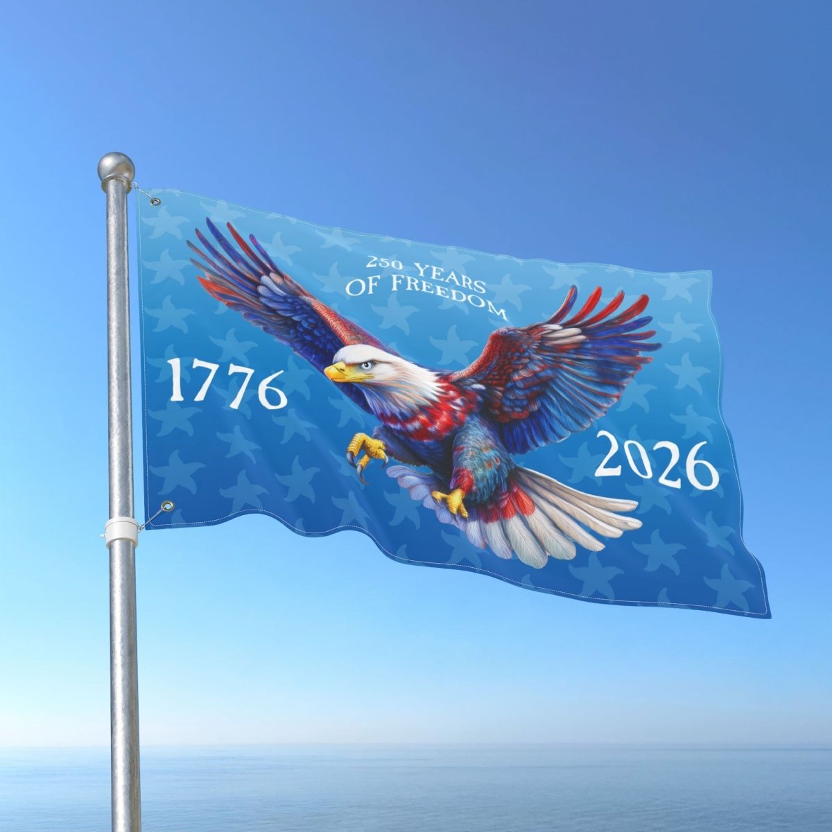 Flag with an eagle design celebrating 250 years of freedom, featuring the years 1776 and 2026 against a blue sky.