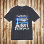 Navy blue t-shirt with 'AMI Strong' graphic on a nautical wood background