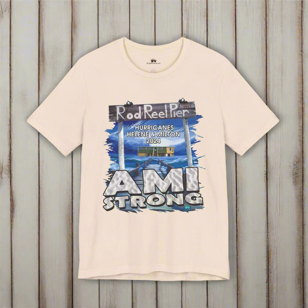Beige t-shirt with 'AMI Strong' graphic design on a rustic nautical wood  background