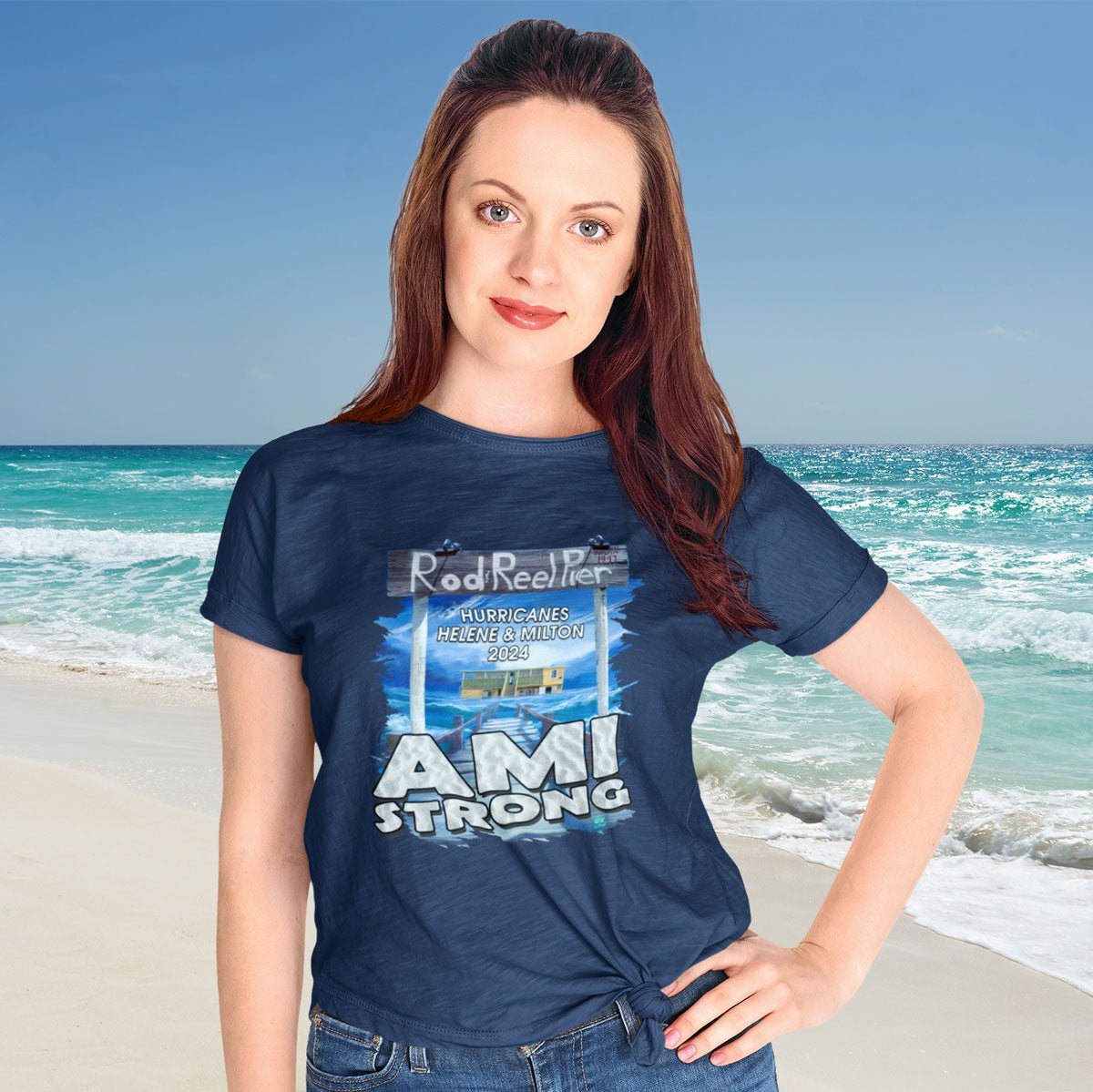 Woman wearing a 'AMI Strong' t-shirt on a beach