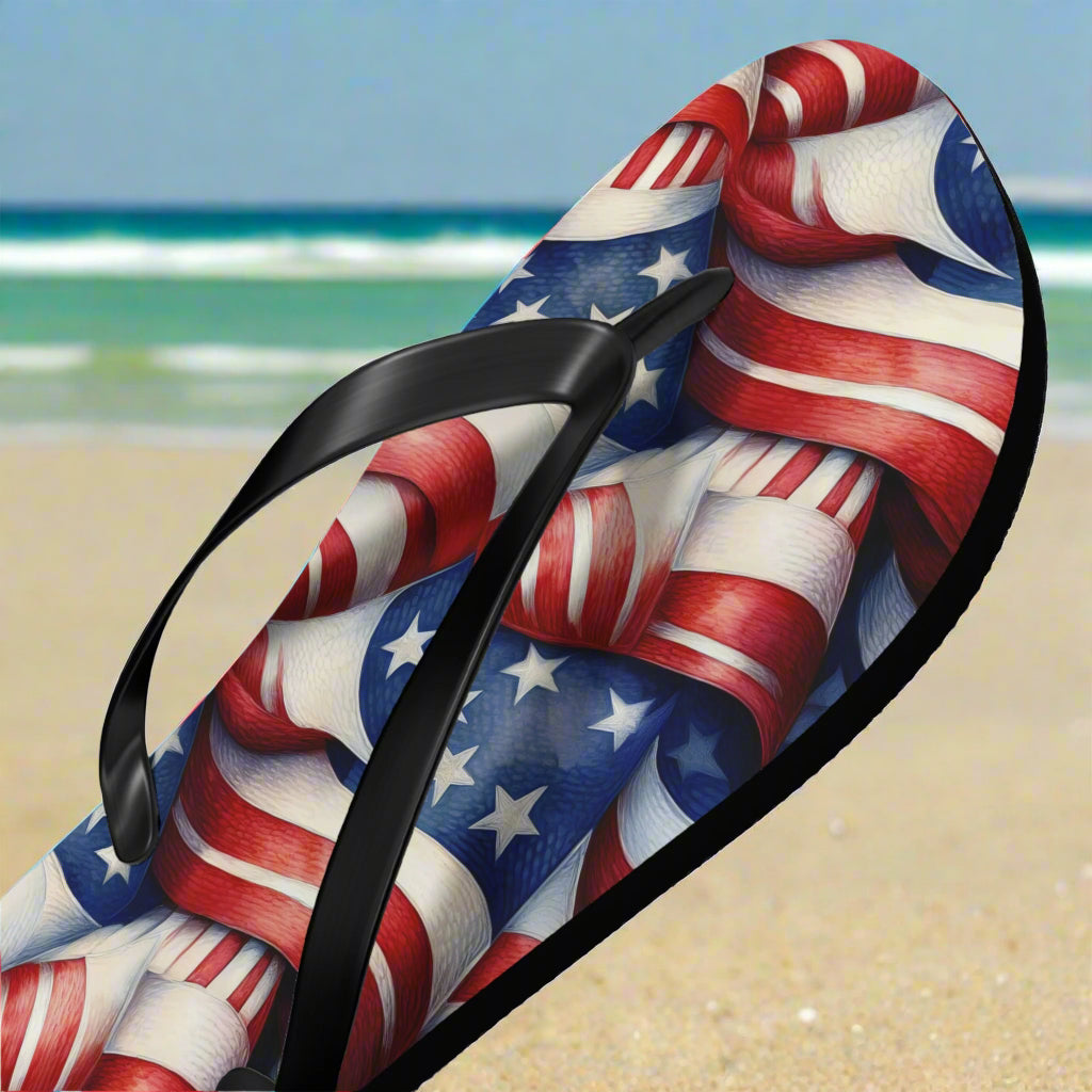 Flip-flop with American flag design on a beach background