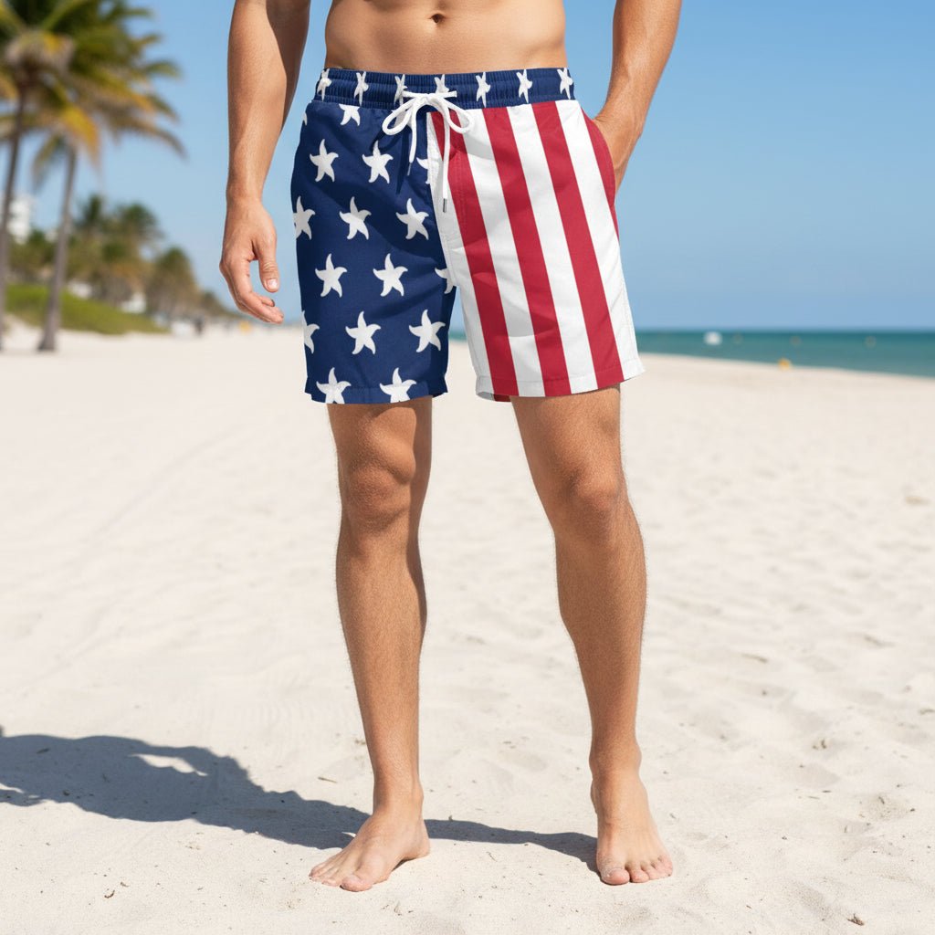 Person wearing American flag patterned shorts on a tropical island beach