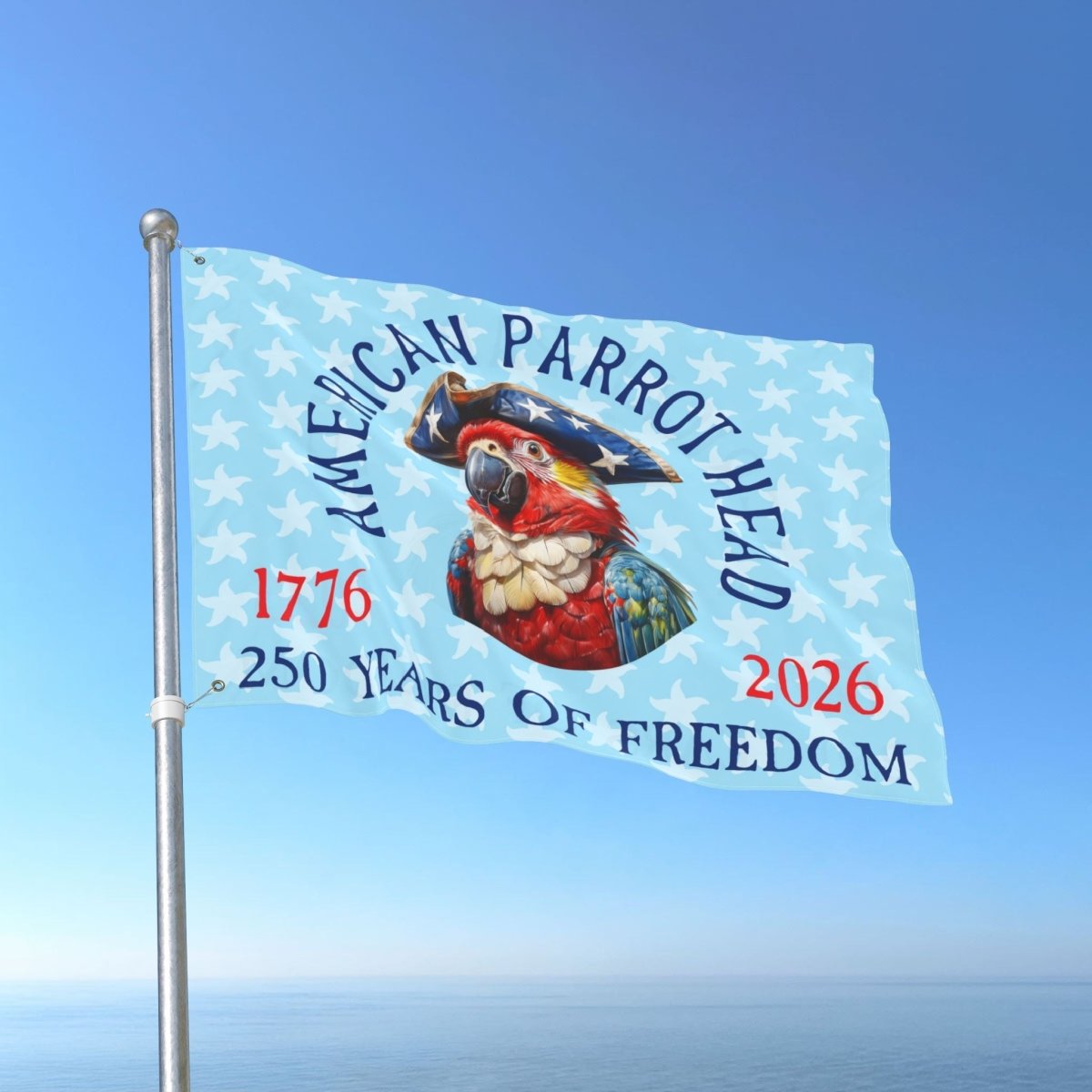Flag with a parrot design and text celebrating 250 years of freedom against a blue sky.