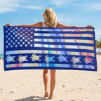 American flag-themed towel with turtle designs on a white background