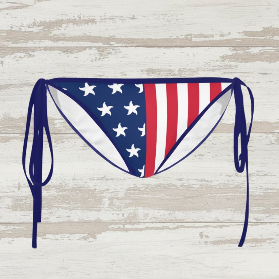 Bikini bottom with American flag design on a faded wood background