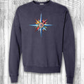 Navy blue sweatshirt with a colorful nautical compass design on a wooden background