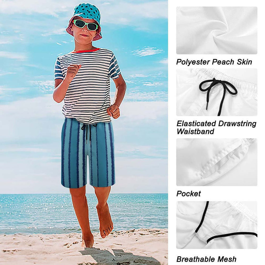 Child on a beach wearing a striped shirt and shorts with close-up details of fabric texture.