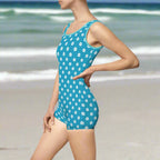 One Piece Vintage Swimsuit in Teal  and aqua trim with white sand dollars in a polka dot pattern.