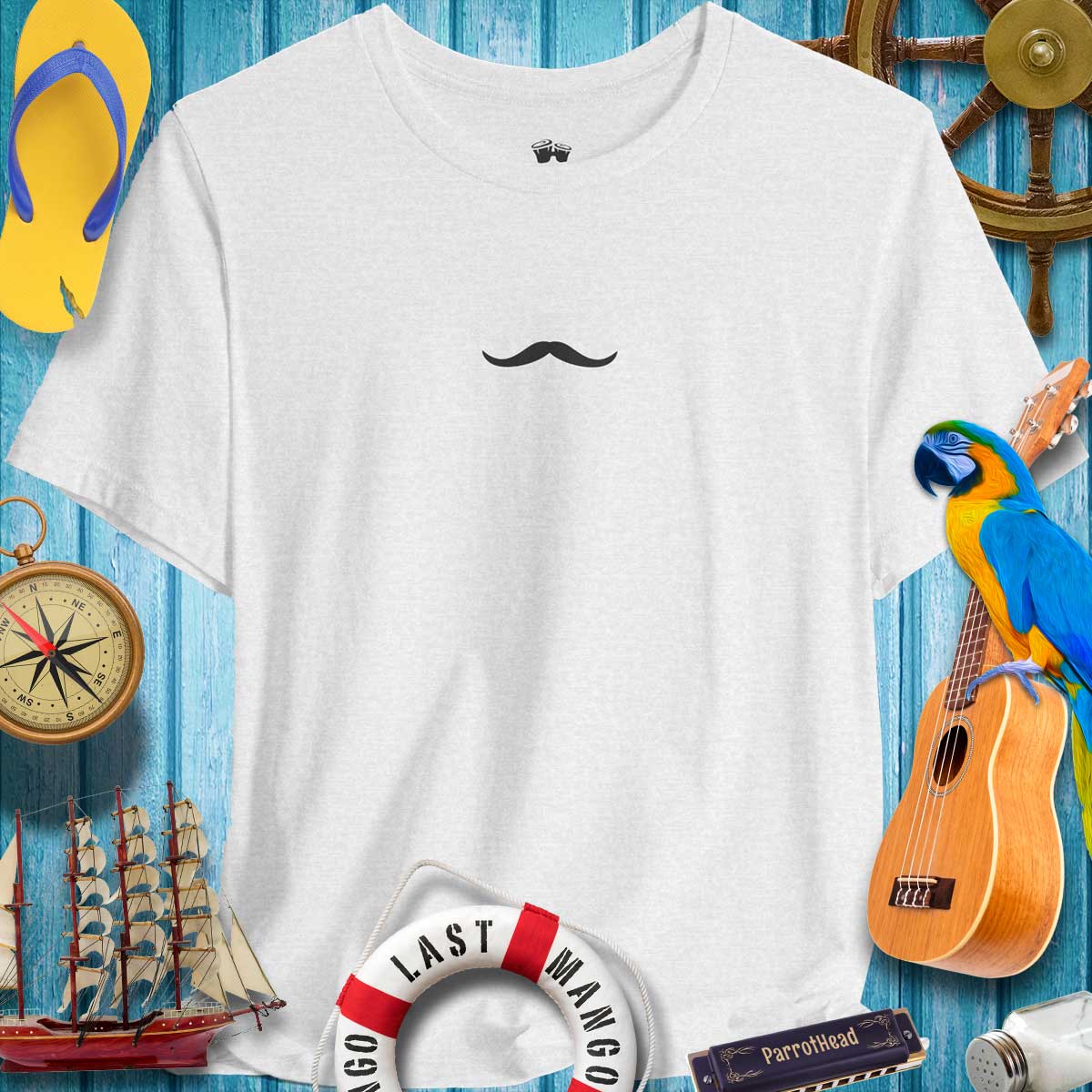 Casual Pencil Thin Mustache T-Shirt for ParrotHeads, surrounded by nautical decor and vibrant beach vibes.