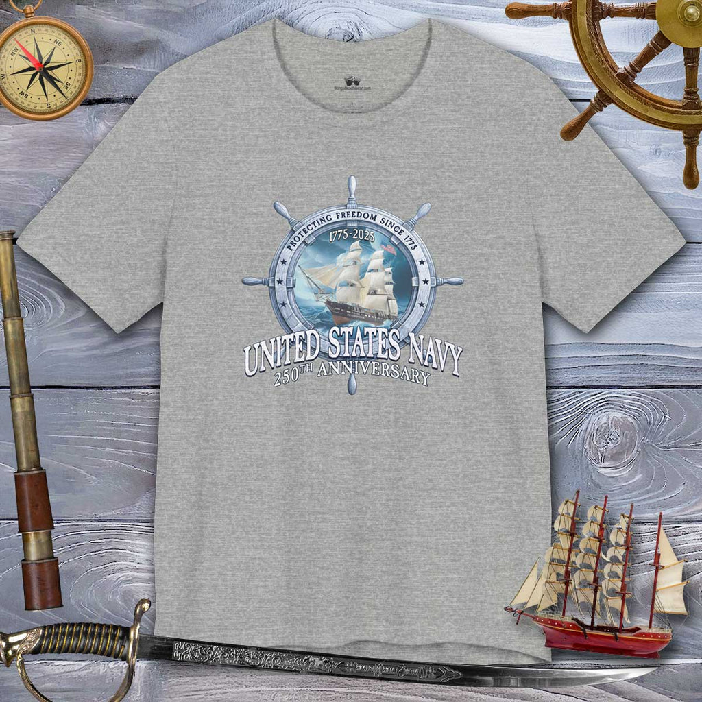 Gray t-shirt with United States Navy logo on a wooden background with USS Constitution and compass decorations