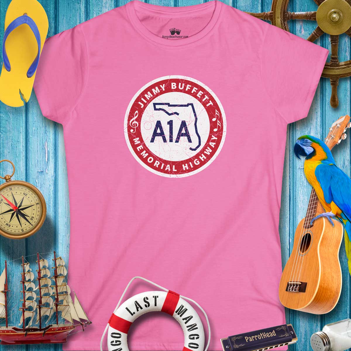 Women's Jimmy Buffett A1A Highway Sign Tee in pink, ideal for beach days and casual outings.