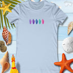 Colorful Junonia seashells design on a beach tee for women, ideal for summer outings and casual gatherings.