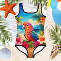 cute baby parrot on a girls one-piece swimsuit floating above the water surrounded by beachy icons like starfish and a beach ball. 
