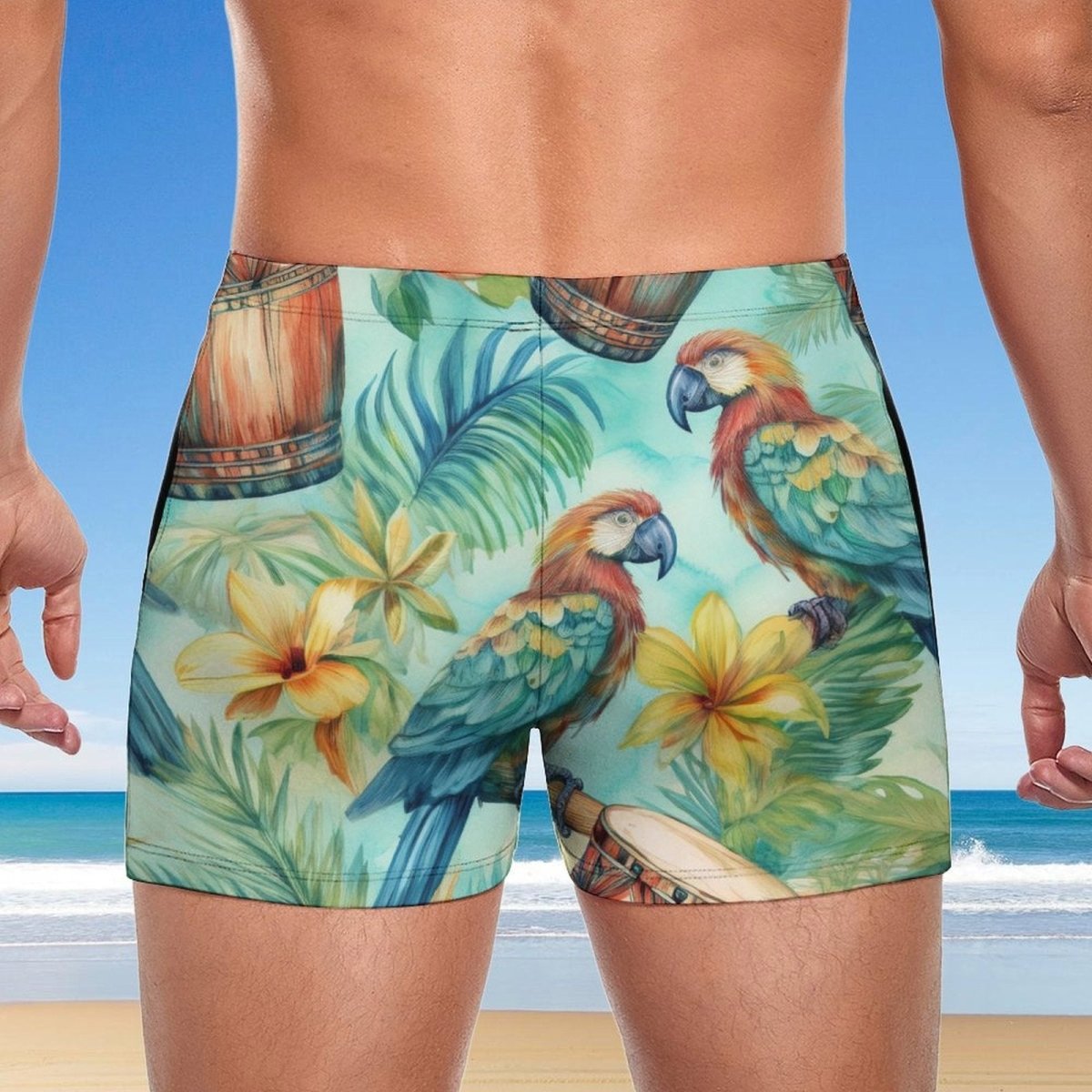 Tropical-themed swim shorts with parrots and flowers on a beach background