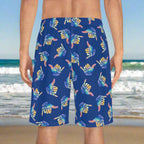Surfer wearing Bongo Beachwear Boardshorts standing the beach waiting for high tide.