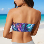 Woman wearing a colorful strapless bikini top on a beach in Miami