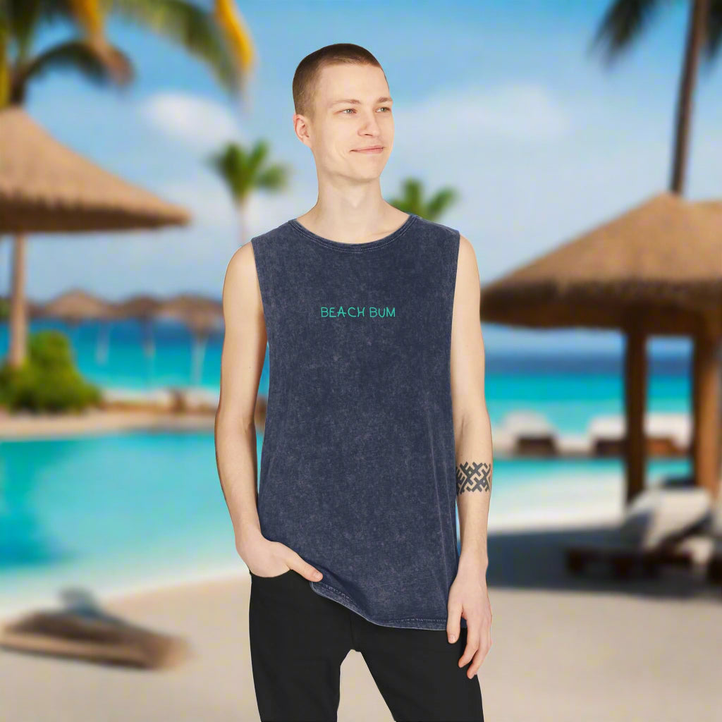 Dude wearing a sleeveless Beach Bum tee. hanging out in swank beach resort.