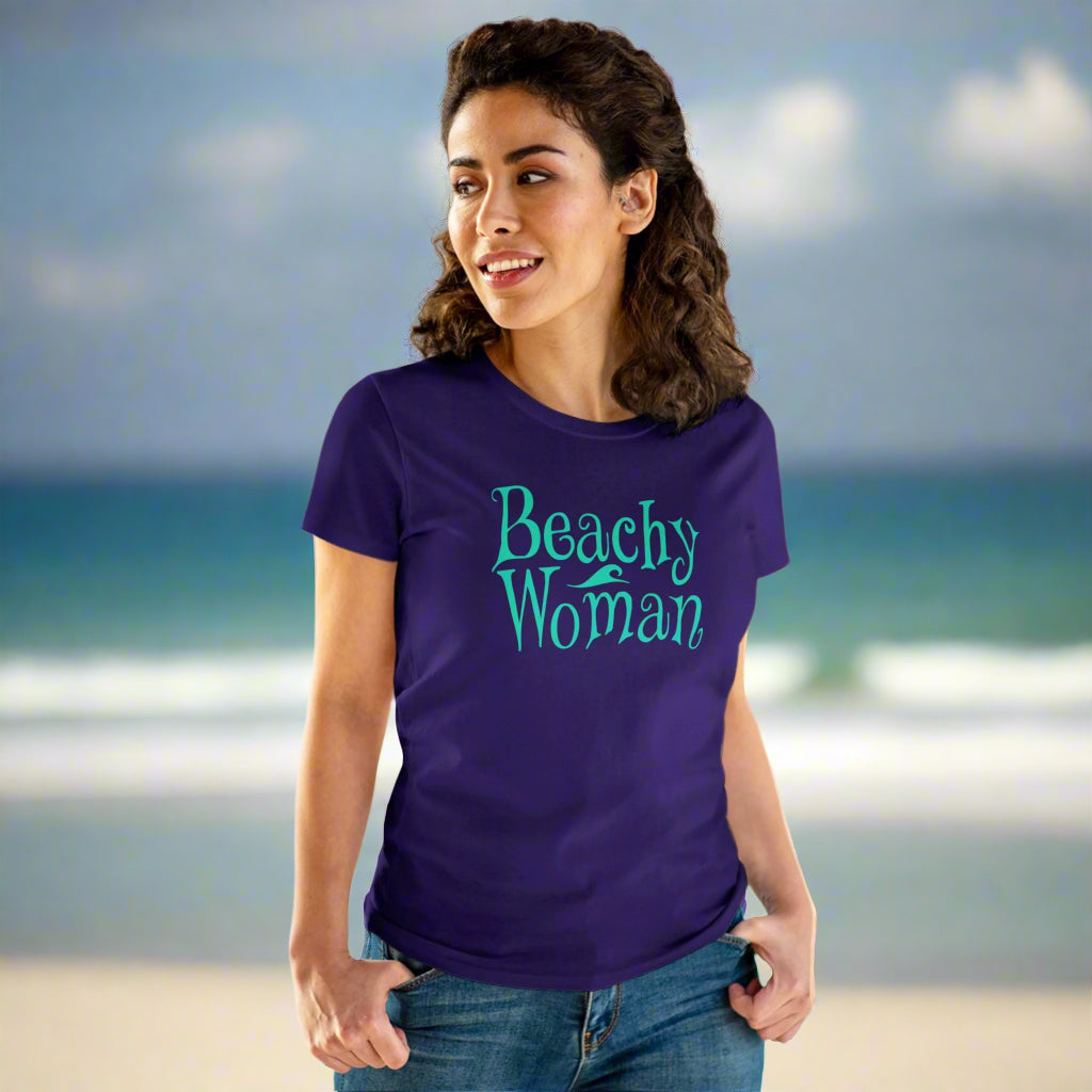 Beachy Women wearing a clever beach Tee on the beach