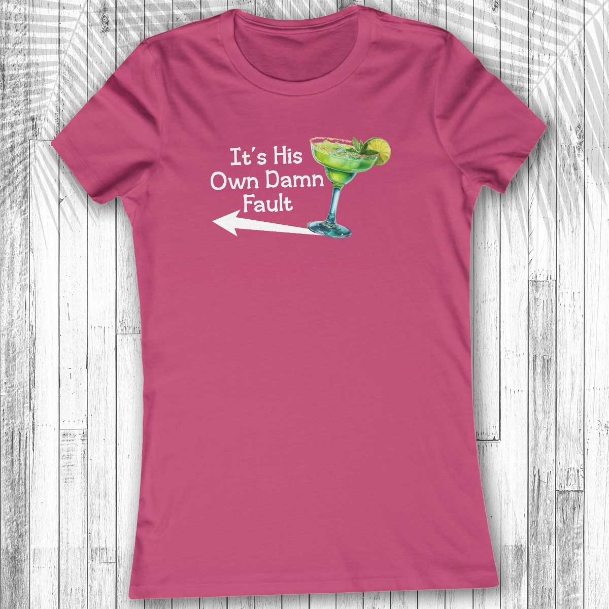 Pink Women's Margarita Tee with a graphic and text on a wooden surface