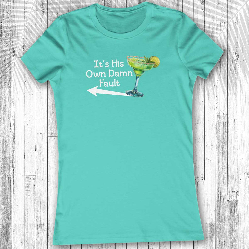 TurquoiseWomen's Margarita Tee  with a graphic and text on a wooden surface