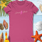 Women's pink t-shirt with 'Shell Yeah' graphic, perfect for beach lovers and summer outings.