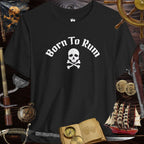 Born to Rum Jolly Roger Pirate Skull casual Bella Canvas T-Shirt on a pirate-themed background.