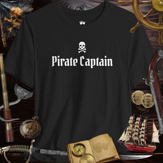 Pirate Captain Unisex 3001c Bella Canvas Tee on a wooden background with pirate accessories and a ship.