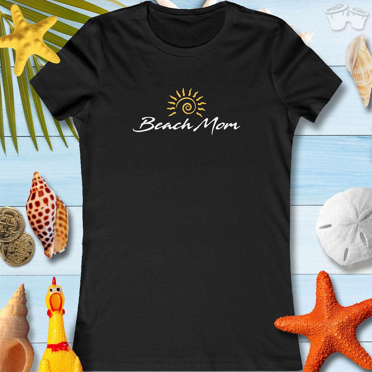 Beach Mom tee on a beach-themed background, perfect for Mother's Day and summer fun.
