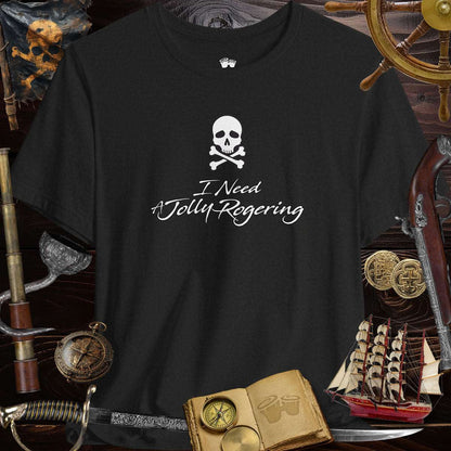 Funny pirate saying T-Shirt features 'I Need A Jolly Rogering' with skull and crossbones design on a black Bella Canvas tee.