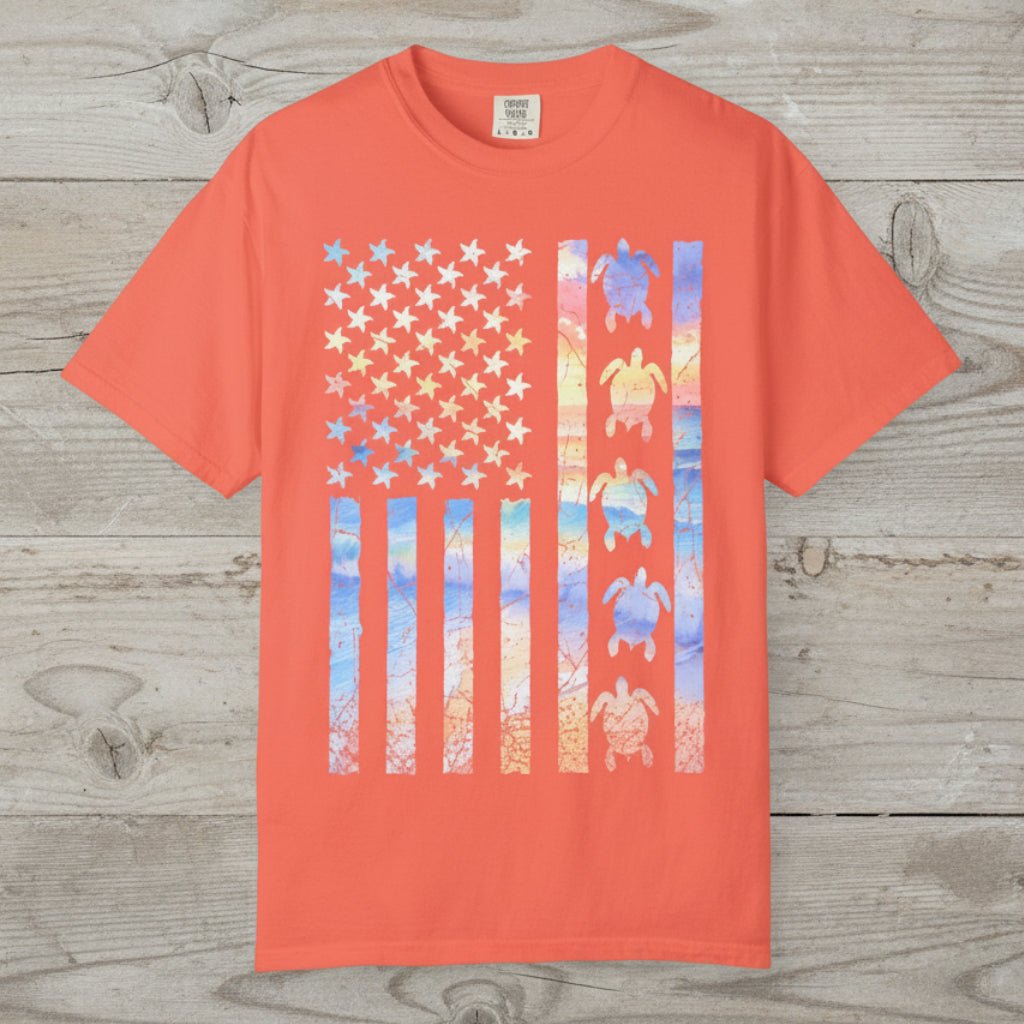Bright salmon t-shirt with American flag design featuring turtles on a nautical wood background
