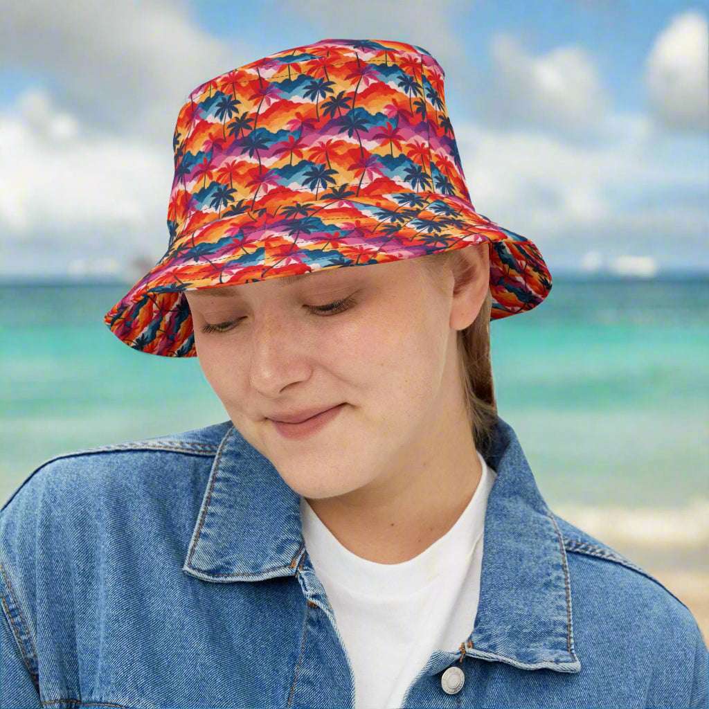 Girl in Waikiki wearing a Bongo Beachwear Bucket Hat with cool Hawaiian style pattern.