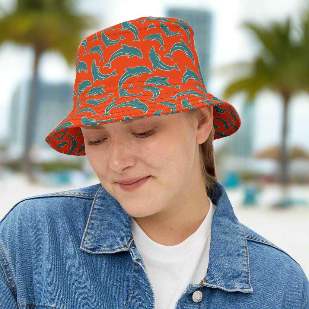 Girl DolFan' Wearing a Bongo Beachwear Bucket Hat with cool dolphin pattern in Miami Team Colors