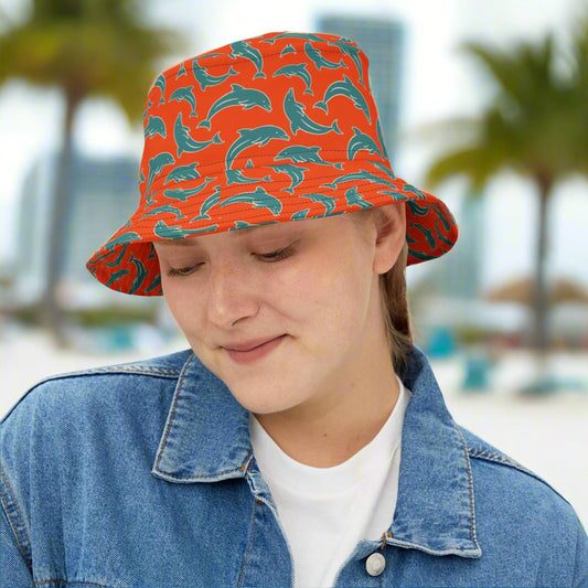 Girl DolFan' Wearing a Bongo Beachwear Bucket Hat with cool dolphin pattern in Miami Team Colors