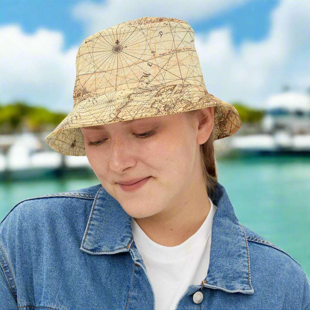Vintage Nautical Chart Bucket Hat worn by woman standing in a marina in Key West