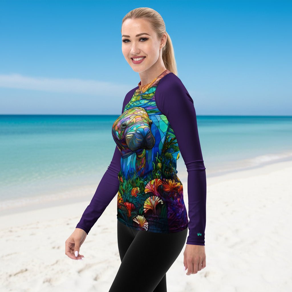 Woman wearing a colorful long-sleeve sun shirt with a Manatee design on Clearwater Beach