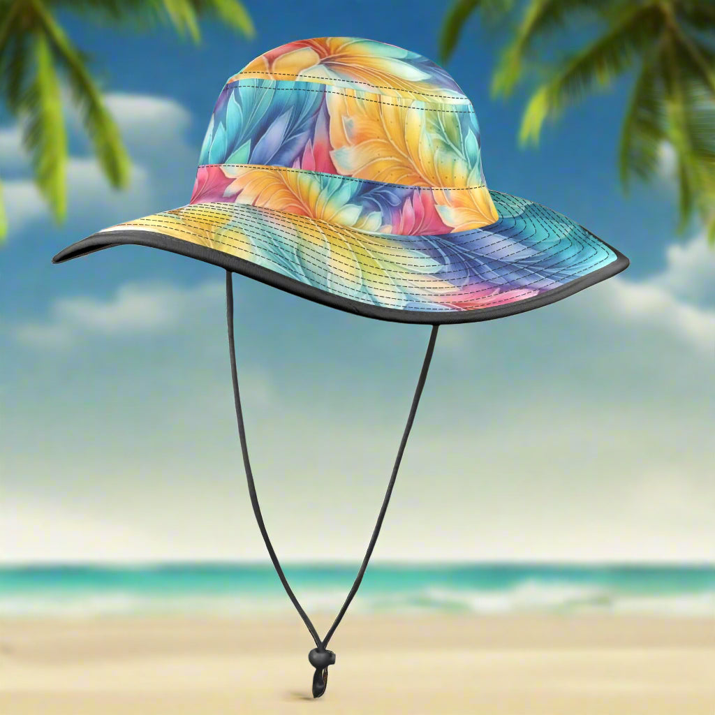 Colorful bucket hat with leaf pattern on a beach island background
