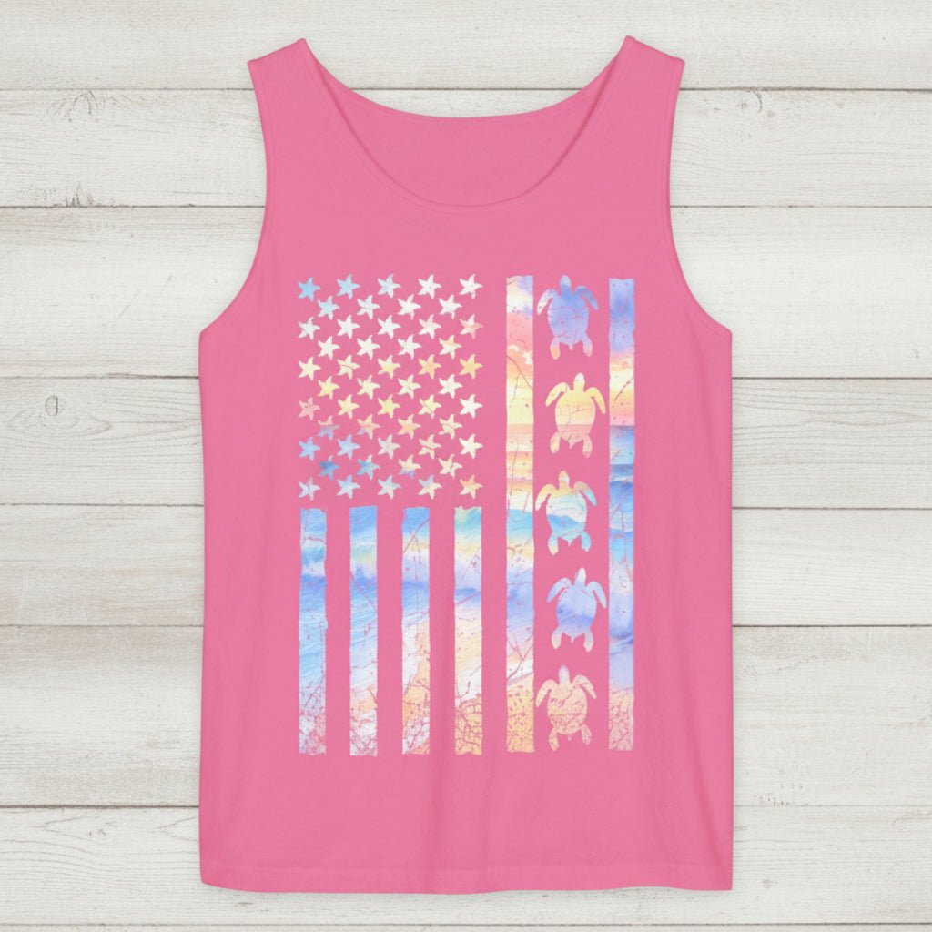 Pink tank top with a colorful American flag design featuring turtles on a nautical wood  background